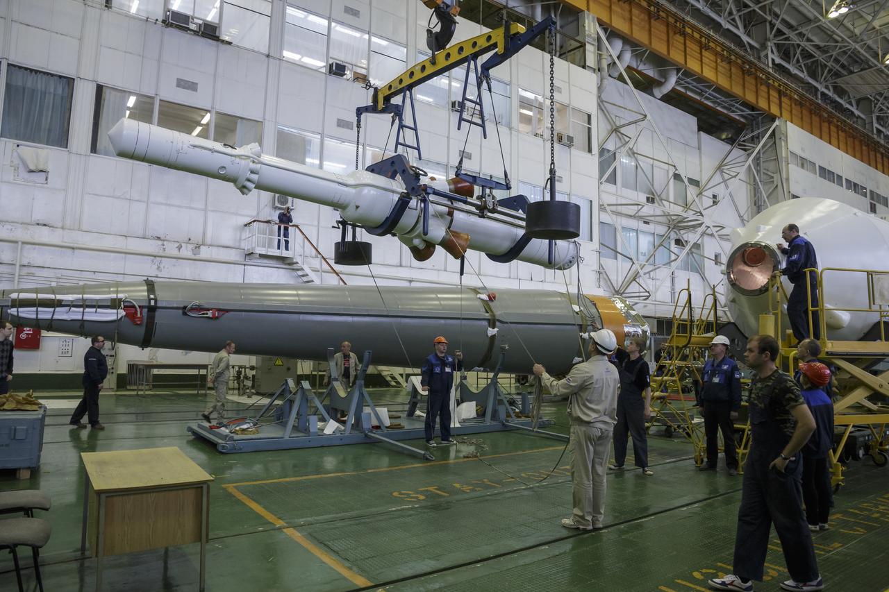 The Soyuz rocket and Soyuz TMA-16M spacecraft are assembled at Building 112 on the Baikonur Cosmodrome on Tuesday, March 24, 2015 in Baikonur, Kazakhstan. NASA Astronaut Scott Kelly, and Russian Cosmonauts Mikhail Kornienko, and Gennady Padalka of the Russian Federal Space Agency (Roscosmos) are scheduled to launch to the International Space Station in the Soyuz TMA-16M spacecraft from the Baikonur Cosmodrome in Kazakhstan March 28, Kazakh time (March 27 Eastern time.) As the one-year crew, Kelly and Kornienko will return to Earth on Soyuz TMA-18M in March 2016. Photo Credit: (NASA/Victor Zelentsov)