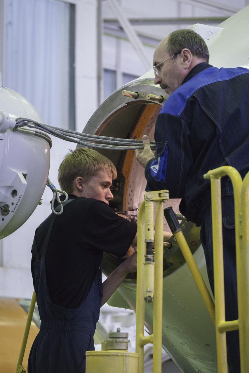 The Soyuz rocket and Soyuz TMA-16M spacecraft are assembled at Building 112 on the Baikonur Cosmodrome on Tuesday, March 24, 2015 in Baikonur, Kazakhstan. NASA Astronaut Scott Kelly, and Russian Cosmonauts Mikhail Kornienko, and Gennady Padalka of the Russian Federal Space Agency (Roscosmos) are scheduled to launch to the International Space Station in the Soyuz TMA-16M spacecraft from the Baikonur Cosmodrome in Kazakhstan March 28, Kazakh time (March 27 Eastern time.) As the one-year crew, Kelly and Kornienko will return to Earth on Soyuz TMA-18M in March 2016. Photo Credit: (NASA/Victor Zelentsov)