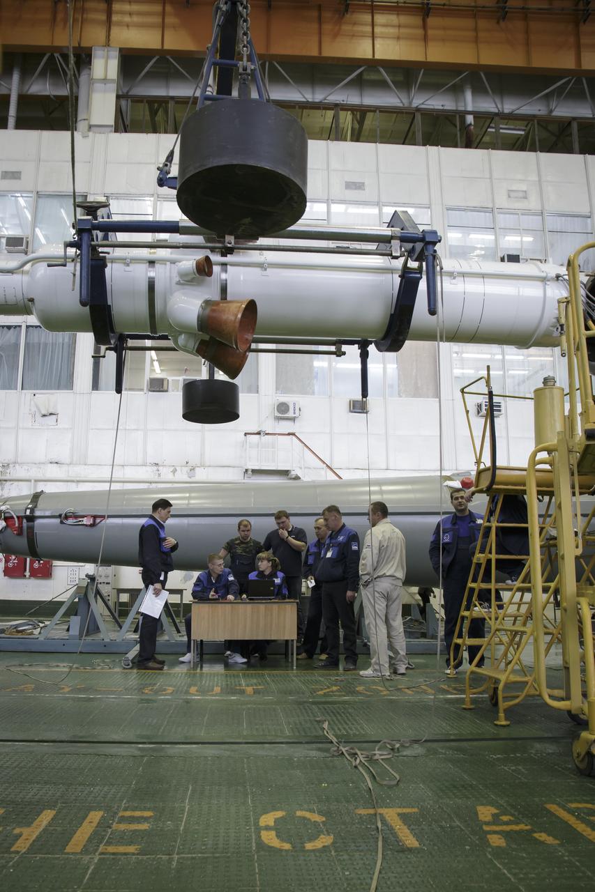 The Soyuz rocket and Soyuz TMA-16M spacecraft are assembled at Building 112 on the Baikonur Cosmodrome on Tuesday, March 24, 2015 in Baikonur, Kazakhstan. NASA Astronaut Scott Kelly, and Russian Cosmonauts Mikhail Kornienko, and Gennady Padalka of the Russian Federal Space Agency (Roscosmos) are scheduled to launch to the International Space Station in the Soyuz TMA-16M spacecraft from the Baikonur Cosmodrome in Kazakhstan March 28, Kazakh time (March 27 Eastern time.) As the one-year crew, Kelly and Kornienko will return to Earth on Soyuz TMA-18M in March 2016. Photo Credit: (NASA/Victor Zelentsov)