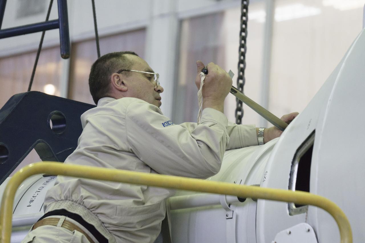 The Soyuz rocket and Soyuz TMA-16M spacecraft are assembled at Building 112 on the Baikonur Cosmodrome on Tuesday, March 24, 2015 in Baikonur, Kazakhstan. NASA Astronaut Scott Kelly, and Russian Cosmonauts Mikhail Kornienko, and Gennady Padalka of the Russian Federal Space Agency (Roscosmos) are scheduled to launch to the International Space Station in the Soyuz TMA-16M spacecraft from the Baikonur Cosmodrome in Kazakhstan March 28, Kazakh time (March 27 Eastern time.) As the one-year crew, Kelly and Kornienko will return to Earth on Soyuz TMA-18M in March 2016. Photo Credit: (NASA/Victor Zelentsov)