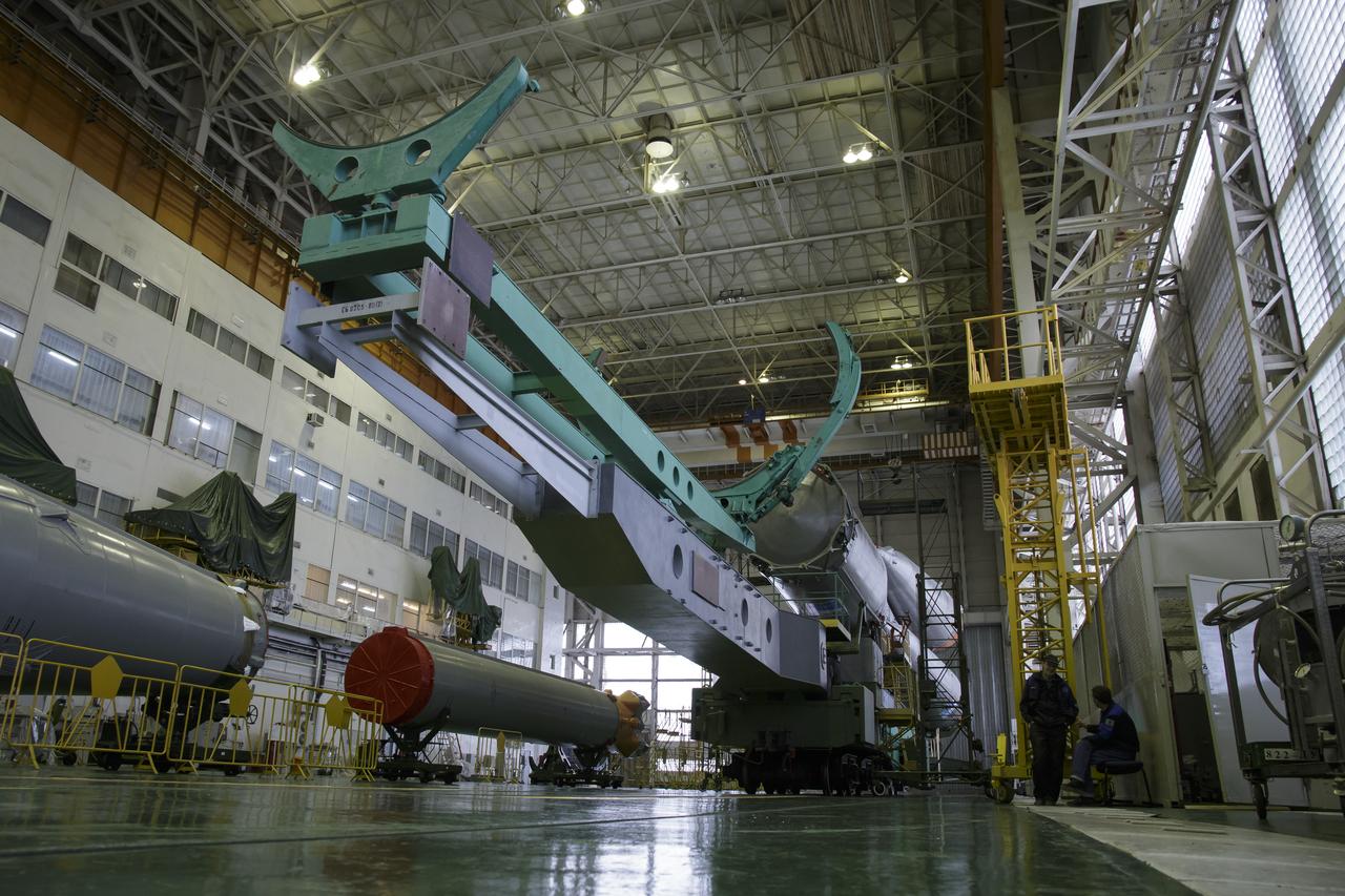 The Soyuz rocket and Soyuz TMA-16M spacecraft are assembled at Building 112 on the Baikonur Cosmodrome on Tuesday, March 24, 2015 in Baikonur, Kazakhstan. NASA Astronaut Scott Kelly, and Russian Cosmonauts Mikhail Kornienko, and Gennady Padalka of the Russian Federal Space Agency (Roscosmos) are scheduled to launch to the International Space Station in the Soyuz TMA-16M spacecraft from the Baikonur Cosmodrome in Kazakhstan March 28, Kazakh time (March 27 Eastern time.) As the one-year crew, Kelly and Kornienko will return to Earth on Soyuz TMA-18M in March 2016. Photo Credit: (NASA/Victor Zelentsov)