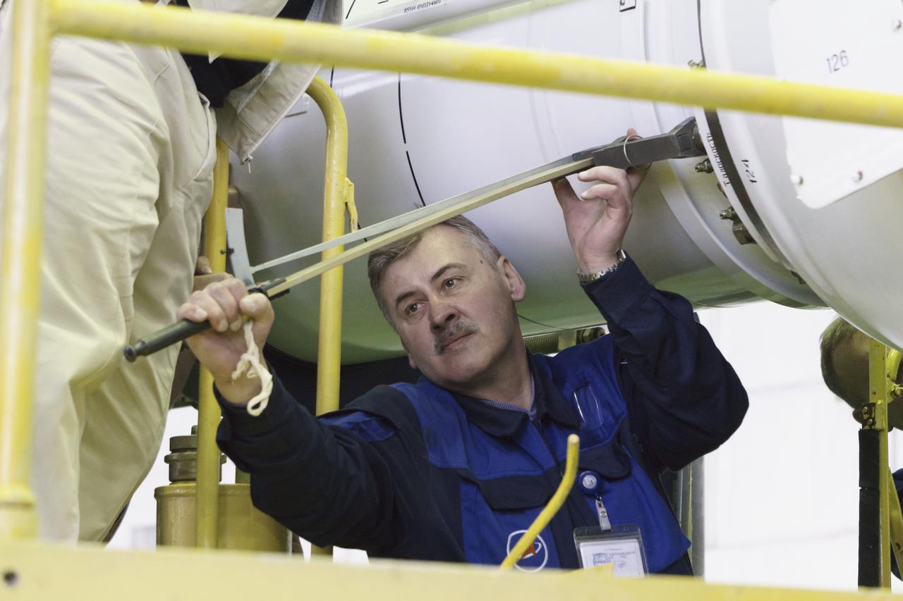 The Soyuz rocket and Soyuz TMA-16M spacecraft are assembled at Building 112 on the Baikonur Cosmodrome on Tuesday, March 24, 2015 in Baikonur, Kazakhstan. NASA Astronaut Scott Kelly, and Russian Cosmonauts Mikhail Kornienko, and Gennady Padalka of the Russian Federal Space Agency (Roscosmos) are scheduled to launch to the International Space Station in the Soyuz TMA-16M spacecraft from the Baikonur Cosmodrome in Kazakhstan March 28, Kazakh time (March 27 Eastern time.) As the one-year crew, Kelly and Kornienko will return to Earth on Soyuz TMA-18M in March 2016. Photo Credit: (NASA/Victor Zelentsov)