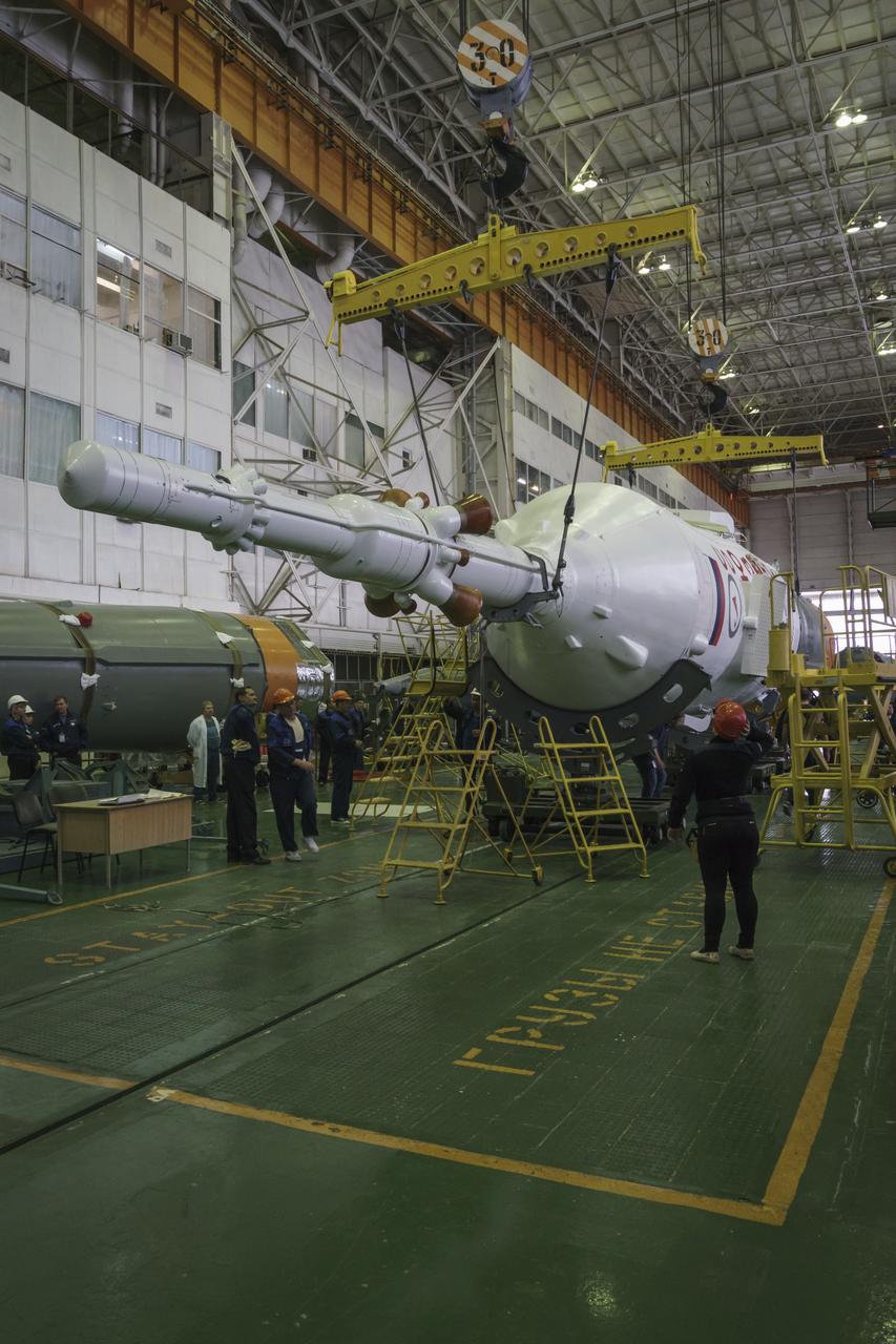The Soyuz rocket and Soyuz TMA-16M spacecraft are assembled at Building 112 on the Baikonur Cosmodrome on Tuesday, March 24, 2015 in Baikonur, Kazakhstan. NASA Astronaut Scott Kelly, and Russian Cosmonauts Mikhail Kornienko, and Gennady Padalka of the Russian Federal Space Agency (Roscosmos) are scheduled to launch to the International Space Station in the Soyuz TMA-16M spacecraft from the Baikonur Cosmodrome in Kazakhstan March 28, Kazakh time (March 27 Eastern time.) As the one-year crew, Kelly and Kornienko will return to Earth on Soyuz TMA-18M in March 2016. Photo Credit: (NASA/Victor Zelentsov)