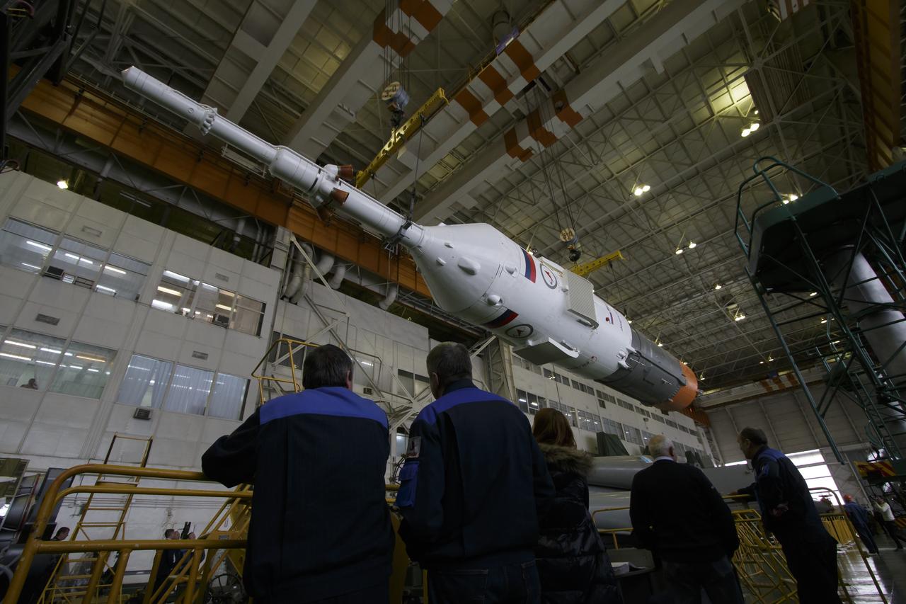 The Soyuz rocket and Soyuz TMA-16M spacecraft are assembled at Building 112 on the Baikonur Cosmodrome on Tuesday, March 24, 2015 in Baikonur, Kazakhstan. NASA Astronaut Scott Kelly, and Russian Cosmonauts Mikhail Kornienko, and Gennady Padalka of the Russian Federal Space Agency (Roscosmos) are scheduled to launch to the International Space Station in the Soyuz TMA-16M spacecraft from the Baikonur Cosmodrome in Kazakhstan March 28, Kazakh time (March 27 Eastern time.) As the one-year crew, Kelly and Kornienko will return to Earth on Soyuz TMA-18M in March 2016. Photo Credit: (NASA/Victor Zelentsov)
