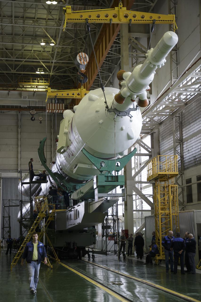 The Soyuz rocket and Soyuz TMA-16M spacecraft are assembled at Building 112 on the Baikonur Cosmodrome on Tuesday, March 24, 2015 in Baikonur, Kazakhstan. NASA Astronaut Scott Kelly, and Russian Cosmonauts Mikhail Kornienko, and Gennady Padalka of the Russian Federal Space Agency (Roscosmos) are scheduled to launch to the International Space Station in the Soyuz TMA-16M spacecraft from the Baikonur Cosmodrome in Kazakhstan March 28, Kazakh time (March 27 Eastern time.) As the one-year crew, Kelly and Kornienko will return to Earth on Soyuz TMA-18M in March 2016. Photo Credit: (NASA/Victor Zelentsov)