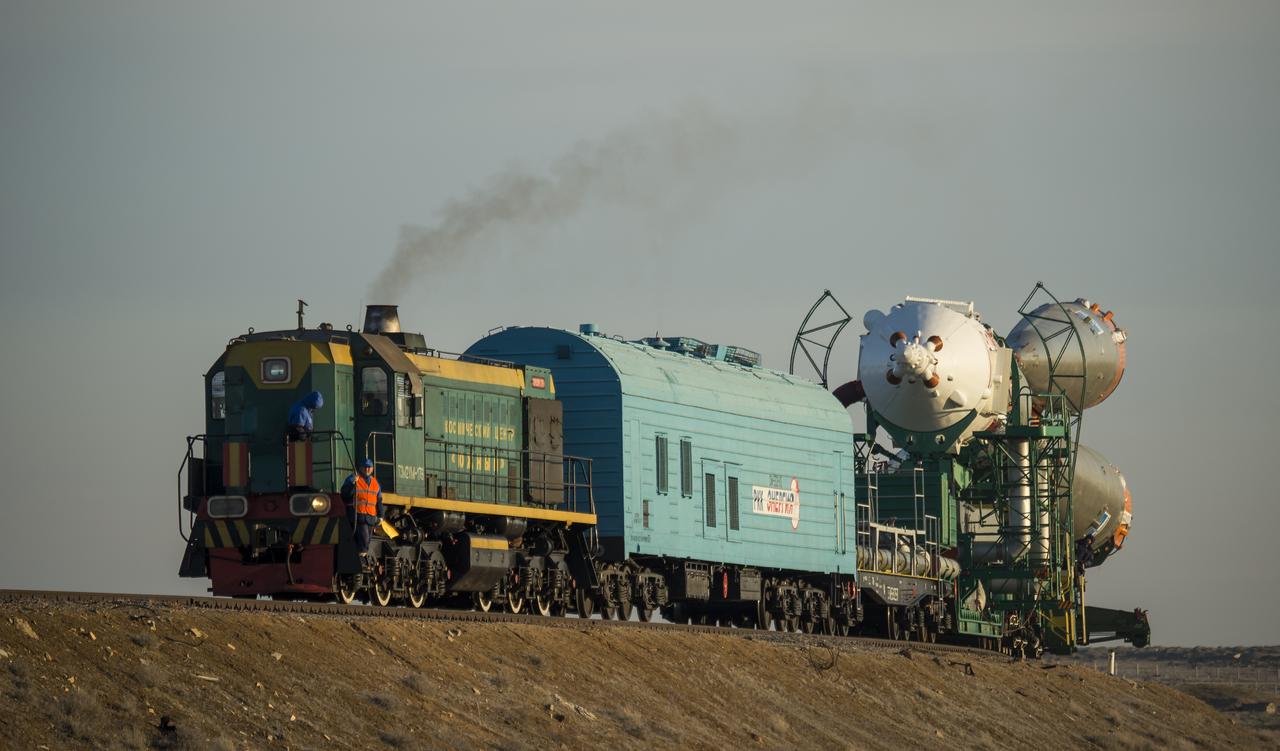 The Soyuz TMA-16M spacecraft is rolled out by train to the launch pad at the Baikonur Cosmodrome, Kazakhstan, Wednesday, March 25, 2015. NASA Astronaut Scott Kelly, and Russian Cosmonauts Mikhail Kornienko, and Gennady Padalka of the Russian Federal Space Agency (Roscosmos) are scheduled to launch to the International Space Station in the Soyuz TMA-16M spacecraft from the Baikonur Cosmodrome in Kazakhstan March 28, Kazakh time (March 27 Eastern time.) As the one-year crew, Kelly and Kornienko will return to Earth on Soyuz TMA-18M in March 2016.  Photo Credit (NASA/Bill Ingalls)
