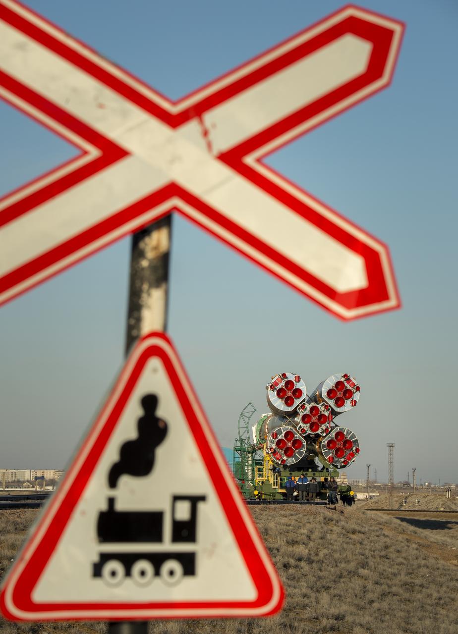 The Soyuz TMA-16M spacecraft is rolled out by train to the launch pad at the Baikonur Cosmodrome, Kazakhstan, Wednesday, March 25, 2015. NASA Astronaut Scott Kelly, and Russian Cosmonauts Mikhail Kornienko, and Gennady Padalka of the Russian Federal Space Agency (Roscosmos) are scheduled to launch to the International Space Station in the Soyuz TMA-16M spacecraft from the Baikonur Cosmodrome in Kazakhstan March 28, Kazakh time (March 27 Eastern time.) As the one-year crew, Kelly and Kornienko will return to Earth on Soyuz TMA-18M in March 2016.  Photo Credit (NASA/Bill Ingalls)