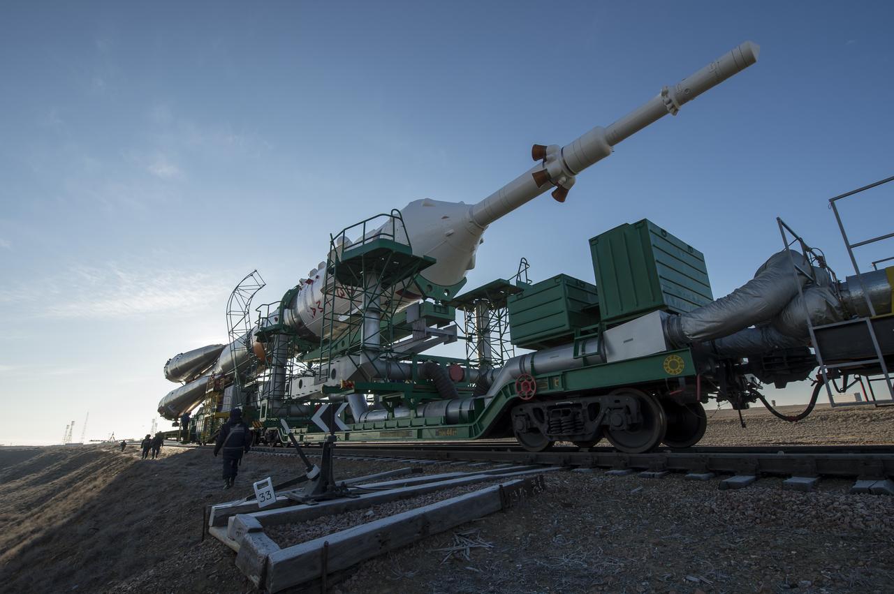The Soyuz TMA-16M spacecraft is rolled out by train to the launch pad at the Baikonur Cosmodrome, Kazakhstan, Wednesday, March 25, 2015. NASA Astronaut Scott Kelly, and Russian Cosmonauts Mikhail Kornienko, and Gennady Padalka of the Russian Federal Space Agency (Roscosmos) are scheduled to launch to the International Space Station in the Soyuz TMA-16M spacecraft from the Baikonur Cosmodrome in Kazakhstan March 28, Kazakh time (March 27 Eastern time.) As the one-year crew, Kelly and Kornienko will return to Earth on Soyuz TMA-18M in March 2016.  Photo Credit (NASA/Bill Ingalls)