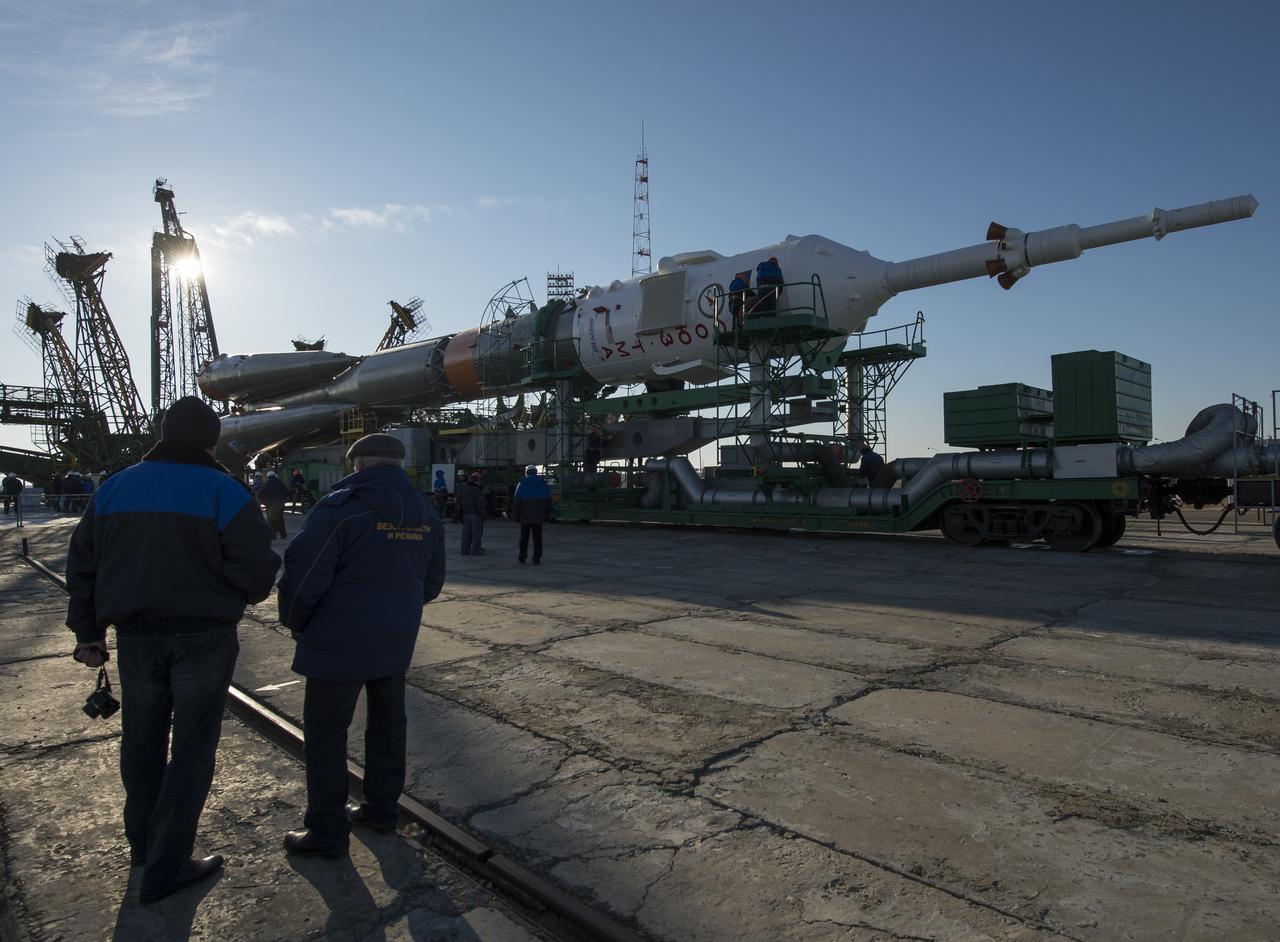 The Soyuz TMA-16M spacecraft is rolled out by train to the launch pad at the Baikonur Cosmodrome, Kazakhstan, Wednesday, March 25, 2015. NASA Astronaut Scott Kelly, and Russian Cosmonauts Mikhail Kornienko, and Gennady Padalka of the Russian Federal Space Agency (Roscosmos) are scheduled to launch to the International Space Station in the Soyuz TMA-16M spacecraft from the Baikonur Cosmodrome in Kazakhstan March 28, Kazakh time (March 27 Eastern time.) As the one-year crew, Kelly and Kornienko will return to Earth on Soyuz TMA-18M in March 2016.  Photo Credit (NASA/Bill Ingalls)