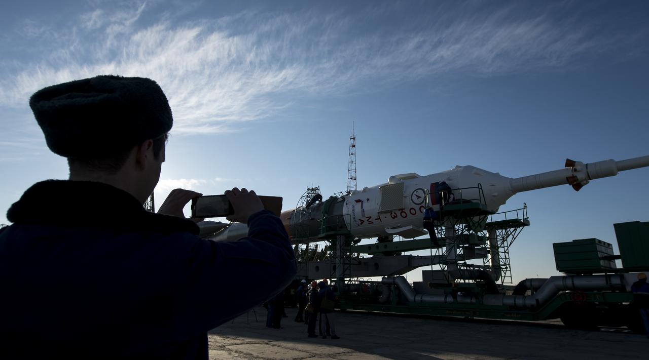 The Soyuz TMA-16M spacecraft is rolled out by train to the launch pad at the Baikonur Cosmodrome, Kazakhstan, Wednesday, March 25, 2015. NASA Astronaut Scott Kelly, and Russian Cosmonauts Mikhail Kornienko, and Gennady Padalka of the Russian Federal Space Agency (Roscosmos) are scheduled to launch to the International Space Station in the Soyuz TMA-16M spacecraft from the Baikonur Cosmodrome in Kazakhstan March 28, Kazakh time (March 27 Eastern time.) As the one-year crew, Kelly and Kornienko will return to Earth on Soyuz TMA-18M in March 2016.  Photo Credit (NASA/Bill Ingalls)