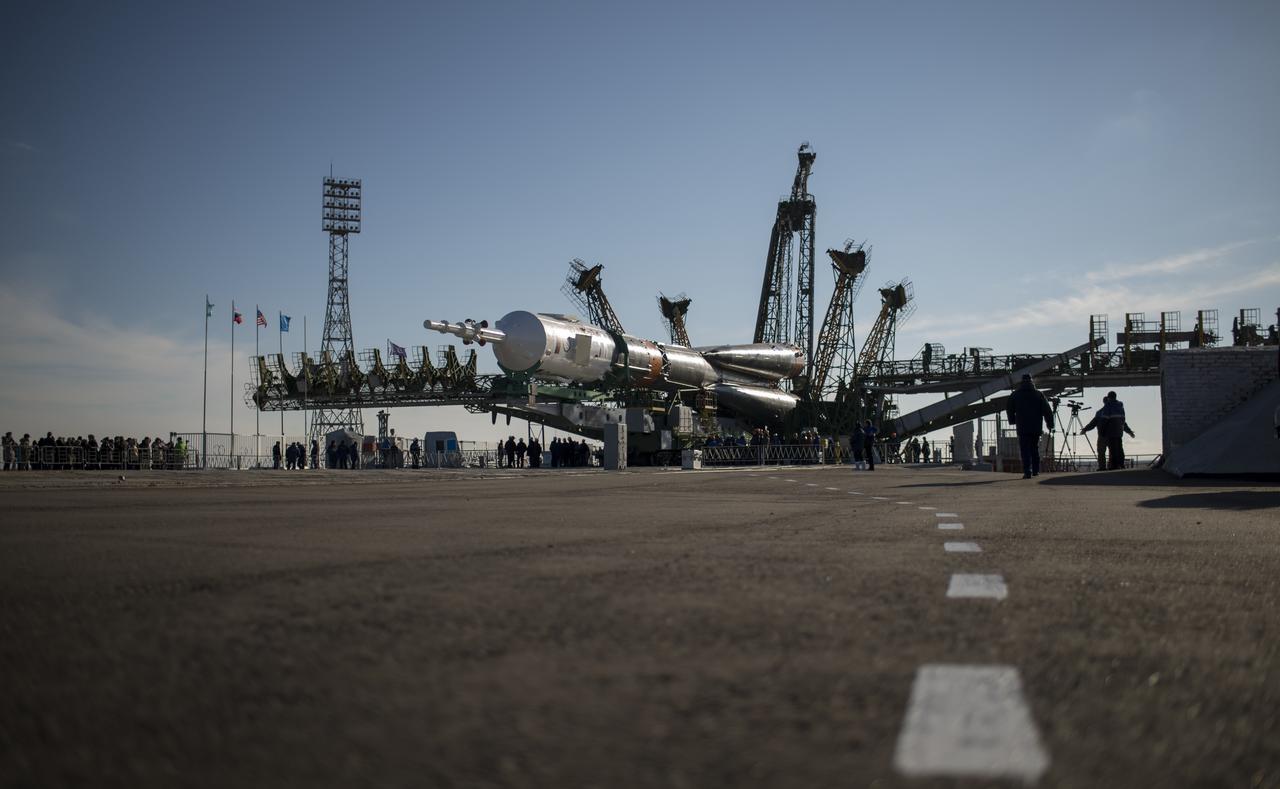 The Soyuz TMA-16M spacecraft is seen after is was rolled out by train to the launch pad at the Baikonur Cosmodrome, Kazakhstan, Wednesday, March 25, 2015. NASA Astronaut Scott Kelly, and Russian Cosmonauts Mikhail Kornienko, and Gennady Padalka of the Russian Federal Space Agency (Roscosmos) are scheduled to launch to the International Space Station in the Soyuz TMA-16M spacecraft from the Baikonur Cosmodrome in Kazakhstan March 28, Kazakh time (March 27 Eastern time.) As the one-year crew, Kelly and Kornienko will return to Earth on Soyuz TMA-18M in March 2016.  Photo Credit (NASA/Bill Ingalls)