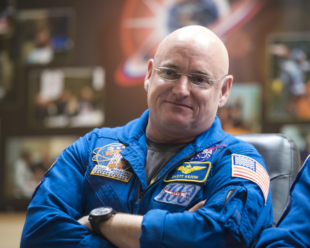 Expedition 43 NASA Astronaut Scott Kelly is seen as he and, Russian cosmonauts Gennady Padalka, and Mikhail Kornienko of the Russian Federal Space Agency (Roscosmos) participate in a crew press conference, Thursday, March 26, 2015, at the Cosmonaut Hotel in Baikonur, Kazakhstan. Kelly, Kornienko, and Padalka launched to the International Space Station in the Soyuz TMA-16M spacecraft from the Baikonur Cosmodrome in Kazakhstan March 28, Kazakh time (March 27 Eastern time.) As the one-year crew, Kelly and Kornienko will return to Earth on Soyuz TMA-18M in March 2016.  Photo Credit (NASA/Bill Ingalls)