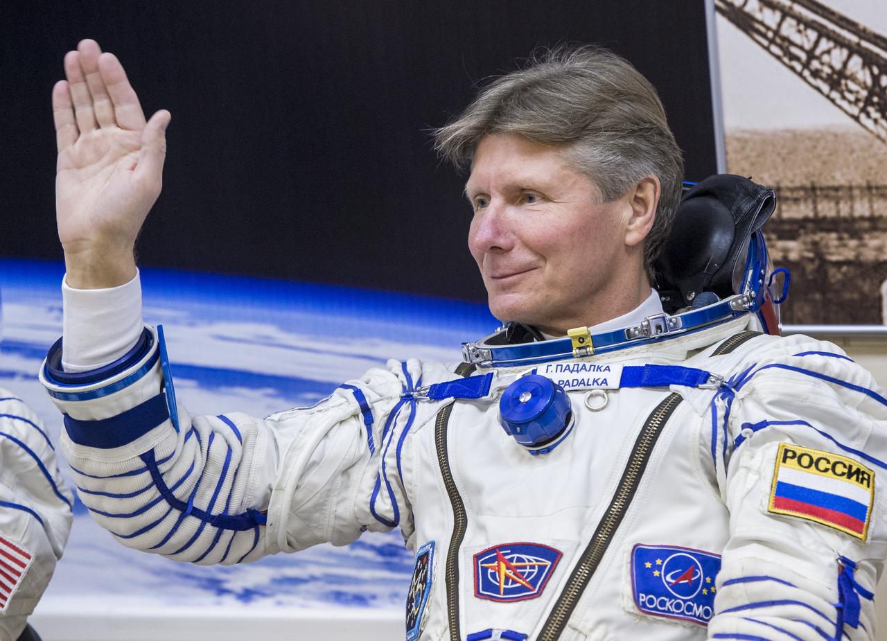 Expedition 43 Russian Cosmonaut Gennady Padalka, of the Russian Federal Space Agency (Roscosmos) waves to family and friends after having his Russian sokol suit pressure checked for launch onboard the Soyuz TMA-16M spacecraft to the International Space Station with fellow crew members NASA Astronaut Scott Kelly, and Russian Cosmonaut Mikhail Kornienko Friday, March 27, 2015 in Baikonor, Kazakhstan. Kelly, Padalka, and Kornienko launched to the ISS from the Baikonur Cosmodrome in Kazakhstan March 28, Kazakh time (March 27 Eastern time.) As the one-year crew, Kelly and Kornienko will return to Earth on Soyuz TMA-18M in March 2016. Photo Credit: ((NASA/Bill Ingalls)