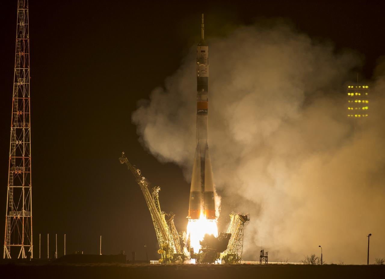 The Soyuz TMA-16M spacecraft is seen as it launches to the International Space Station with Expedition 43 NASA Astronaut Scott Kelly, Russian Cosmonauts Mikhail Kornienko, and Gennady Padalka of the Russian Federal Space Agency (Roscosmos) onboard Saturday, March 28, 2015, Kazakh time (March 27 Eastern time) from the Baikonur Cosmodrome in Kazakhstan. As the one-year crew, Kelly and Kornienko will return to Earth on Soyuz TMA-18M in March 2016. Photo Credit (NASA/Bill Ingalls)