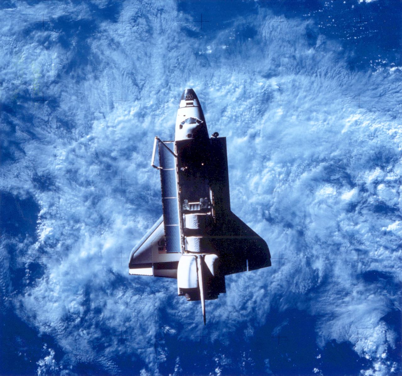 STS-7, Orbiter Challenger in orbit, taken from camera aboard Shuttle Pallet Satellite (SPAS) [Germany]