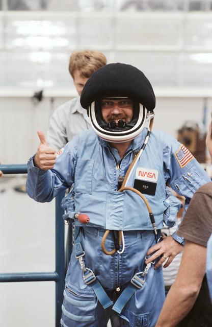 NASA image: Payload Specialist Scully-Power in full flight suit with helmet