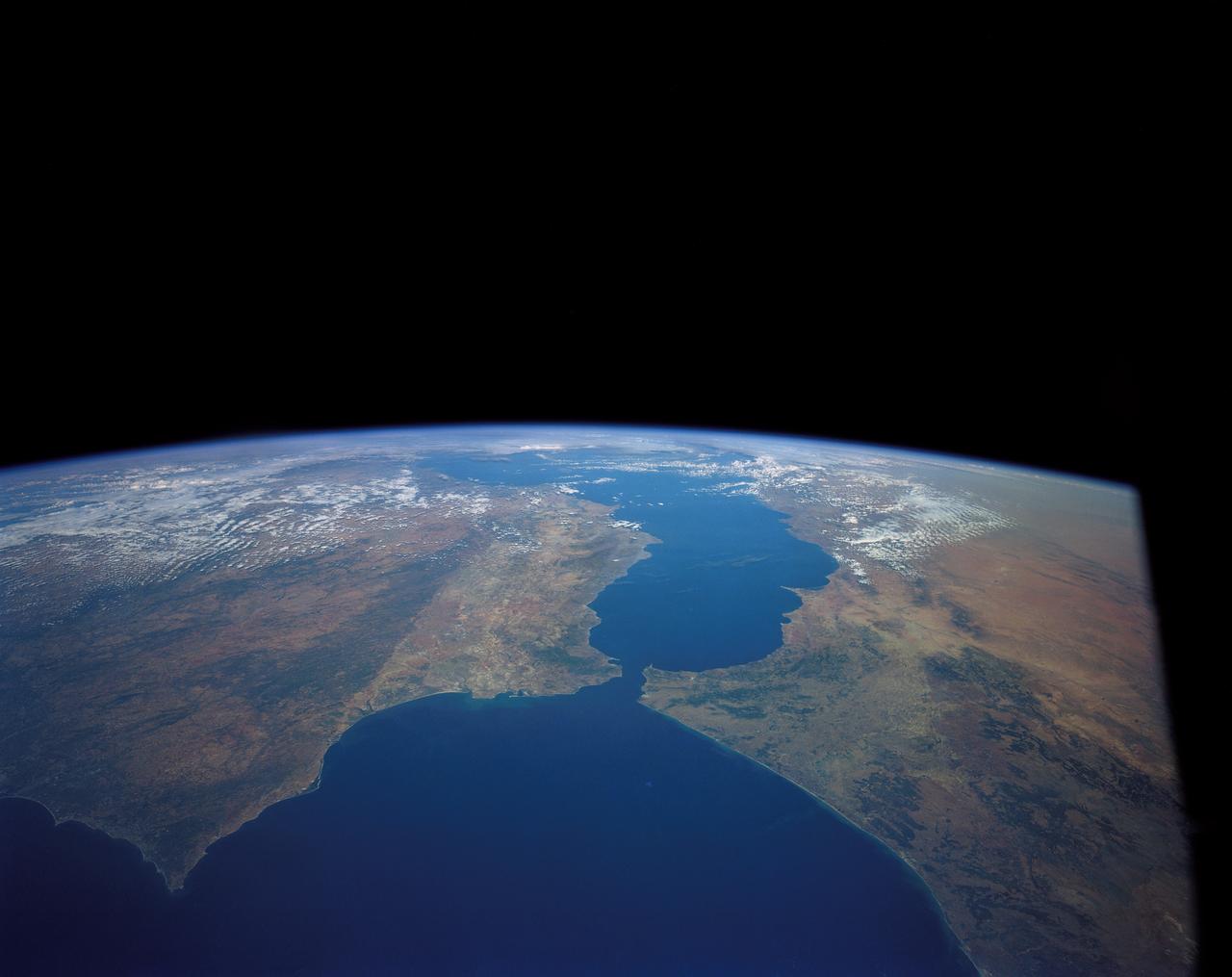 41G-120-082 (5-13 Oct.  1984) --- This High oblique view was photographed with a medium format camera aboard the Earth-orbiting space shuttle Challenger. It features the Strait of Gibraltar and the Mediterranean Sea. Unlike vertical photographs from this area taken by crews of previous spaceflights, this oblique view allows extensive viewing into Spain and Morocco. Photo credit: NASA