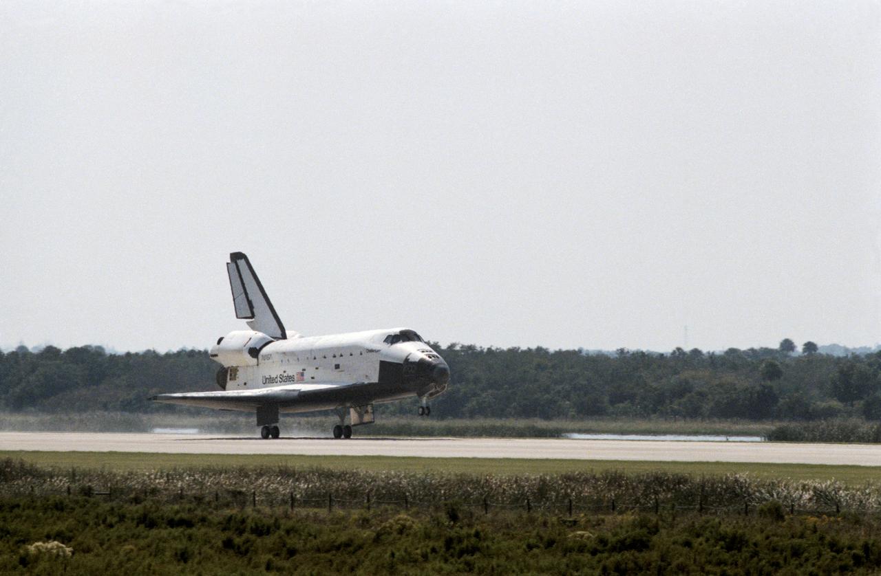 41G-90218 (13 October 1984) --- Space Shuttle Challenger makes its second touchdown at Kennedy Space Center's landing facility. The photo was taken by Otis Imboden.