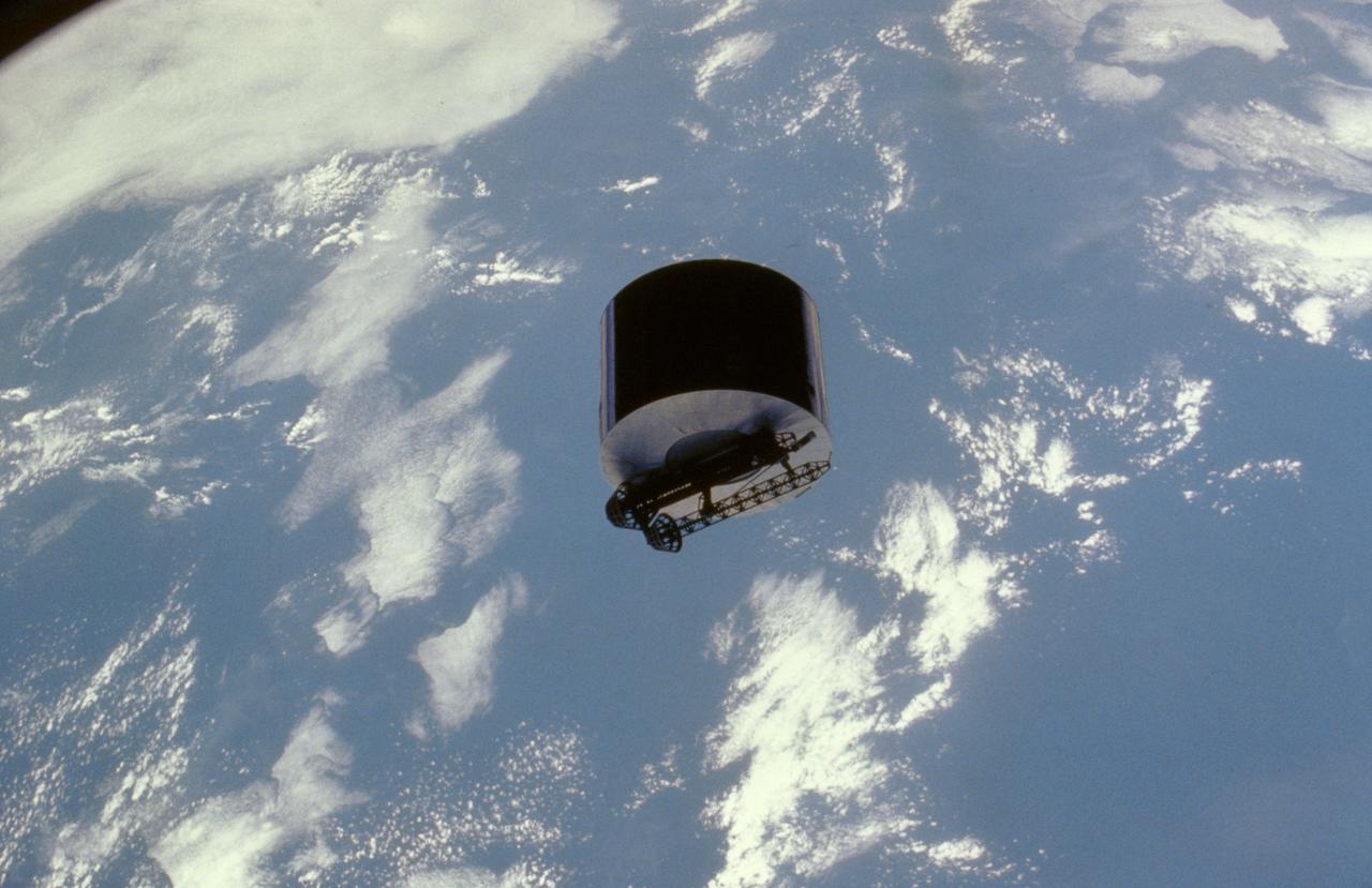 41D-02-020 (31 Aug 1984) --- The Syncom IV (Leasat-2) spacecraft stands out against white clouds above the Atlantic Ocean moments after departing the Discovery's cargo bay in a frisbee-like manner.  The Syncom's deployment marked the second of three scheduled satellite placements for the six member crew of the six-day 41-D flight.  A later frame (41D-32-067) shows the spacecraft after a slender antenna had been deployed.