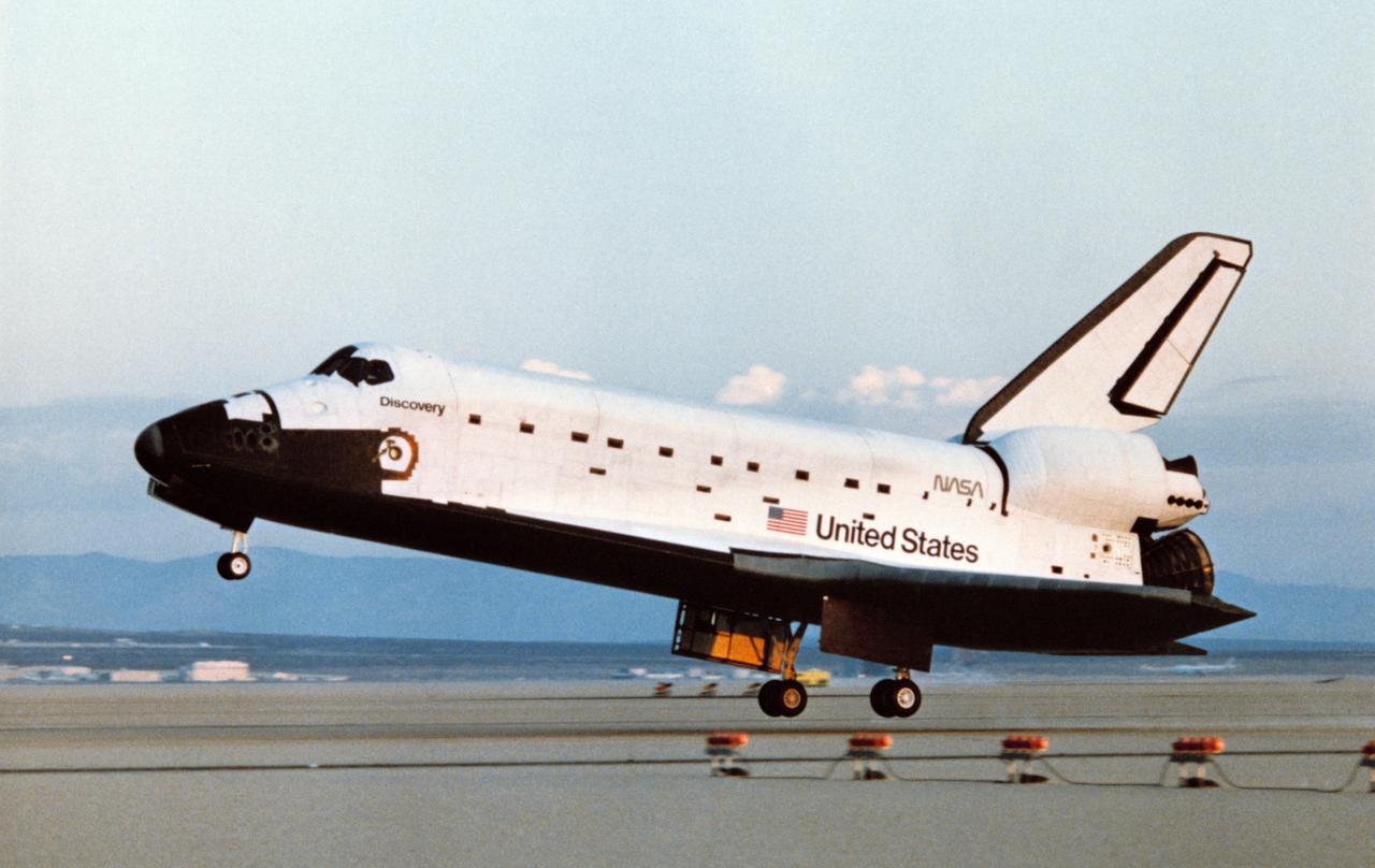 41D-3299 (5 Sept 1984) --- The Space Shuttle Discovery was captured on film just prior to touchdown on Runway 17 at Edwards Air Force Base to successfully complete a six-day mission in space.  Inside were Henry W. Hartsfield, Jr., Michael L., Coats, Richard M. (Mike) Mullane, Steven A. Hawley, Judith A. Resnik and Charles D. Walker.  Mission duration time was six days, 56 minutes and four seconds.