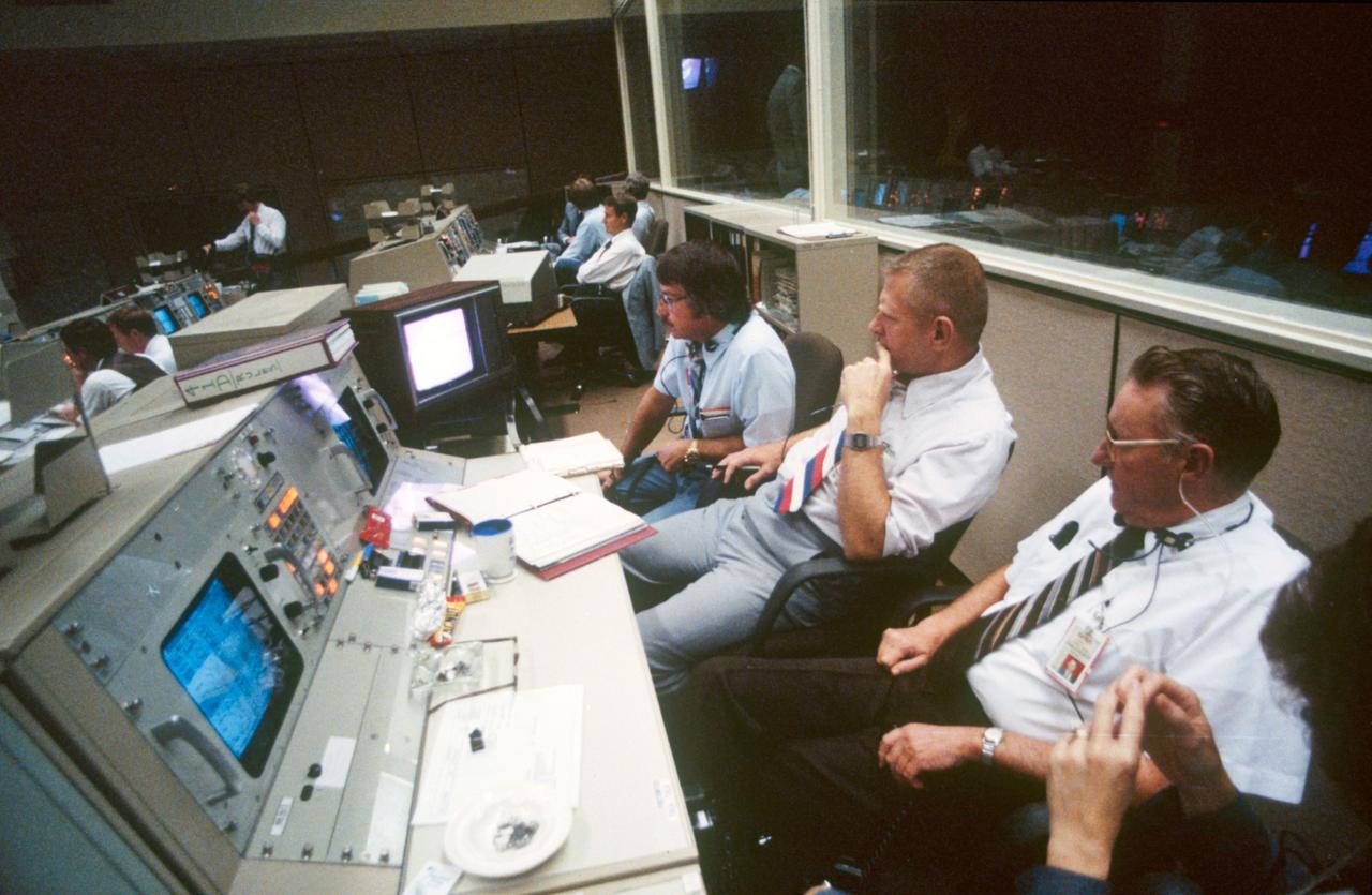 41D-3073 (30 Aug 1984) --- The beginning stages of a busy six-day mission are monitored by some NASA officials in the flight control room (FCR-1) of the Johnson Space Center's (JSC) mission control center (MCC). They are (l.-r., foreground) Daniel M. Germany, manager of the Shuttle flight equipment project offices; Eugene F. Kranz, director of mission operations; and Clifford E. Charlesworth, director of space operations.
