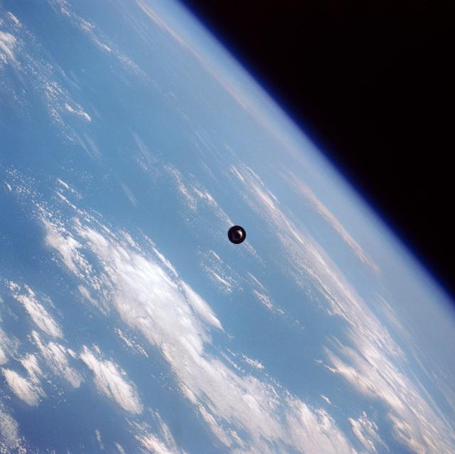 NASA image: View of the SBS-4 communications satellite in orbit above the earth