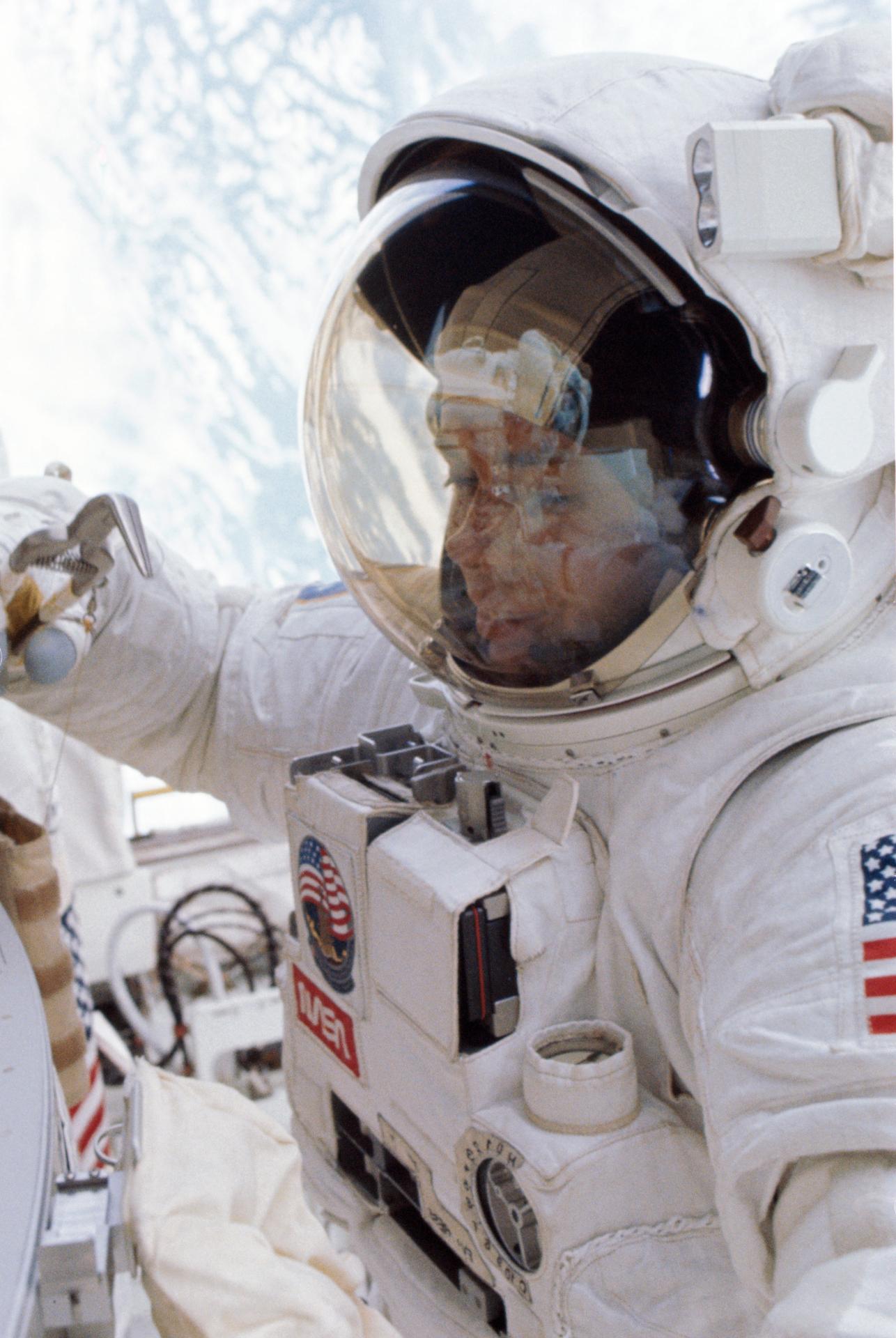 Astronaut David C. Leestma is seen on a spacewalk