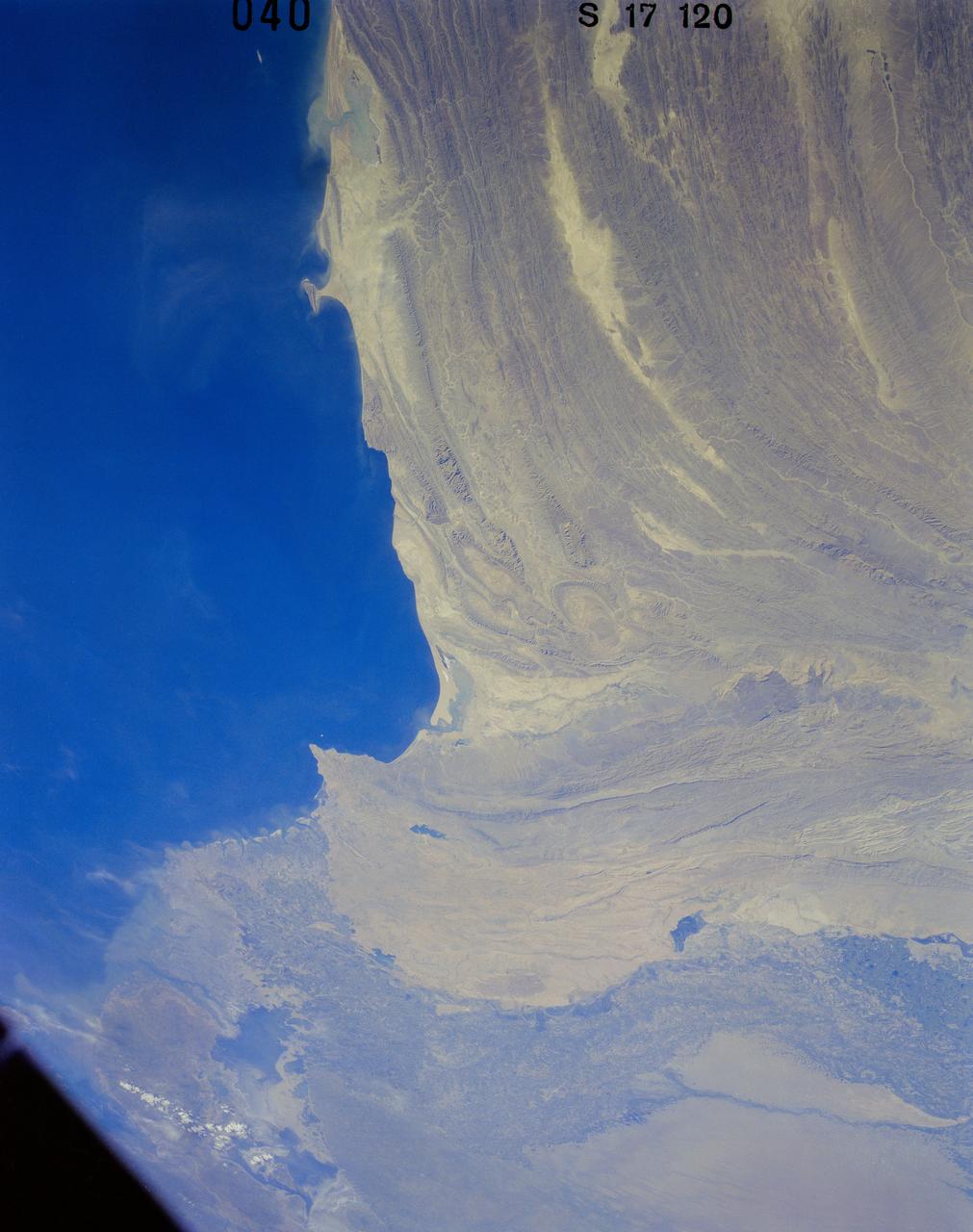 41G-120-040 (5-13 Oct. 1984) --- Pakistan, featuring the city of Karachi, the Makran mountain range, the mouth of the Indus River and the North Arabian Sea were photographed with a medium format camera aboard the space shuttle Challenger during the 41-G mission.  Photo credit: NASA