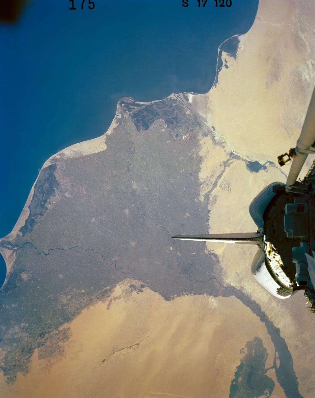 41G-120-175 (5-13 Oct. 1984) --- Egypt and the Nile River Delta are easily recognizable in this 250mm frame photographed by one of the seven 41-G crew members aboard the Earth-orbiting space shuttle Challenger.  Cairo and the Egyptian pyramids are also visible in the lower left side of this photograph. The 41-G crew consisted of astronauts Robert L. Crippen, commander, Jon A. McBride, pilot; Mission Specialists Kathryn D. Sullivan, Sally K. Ride, and David D. Leestma; along with Canadian astronaut Marc Garneau; and Paul D. Scully-Power, both payload specialists. Photo credit: NASA
