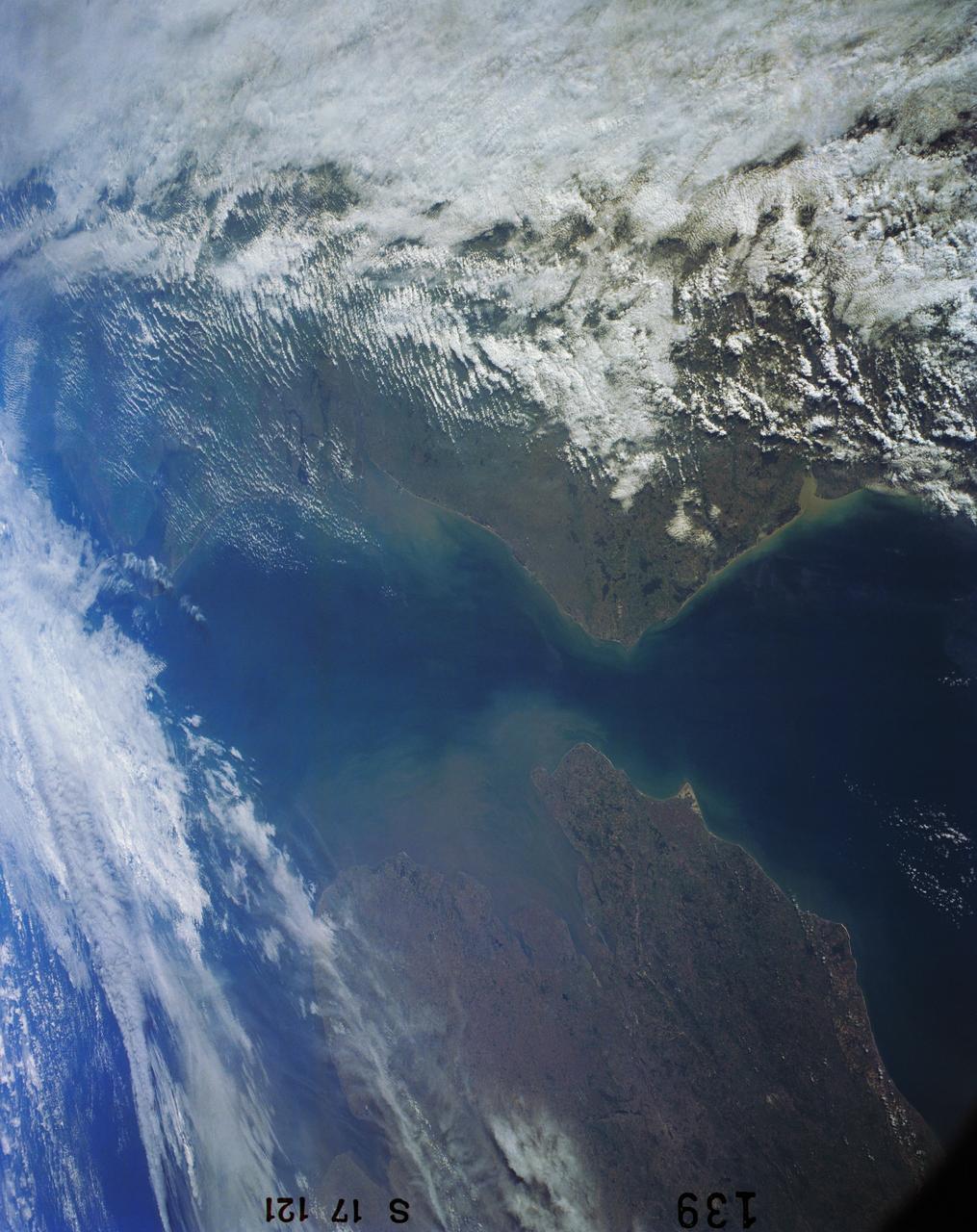 41G-121-139 (5-13 Oct. 1984) --- The Strait of Dover and London, seldom seen in space photography, can be delineated in this medium format camera's scene showing parts of England and France from onboard the Earth-orbiting space shuttle Challenger.  Parts of the Thames River can also be traced in the frame.  The 41-G crew consisted of astronauts Robert L. Crippen, commander; Jon A. McBride, pilot; and Mission Specialists Kathryn D. Sullivan, Sally K. Ride, and David D. Leestma; along with Canadian astronaut Marc Garneau; and Paul D. Scully-Power, both payload specialists. Photo credit: NASA