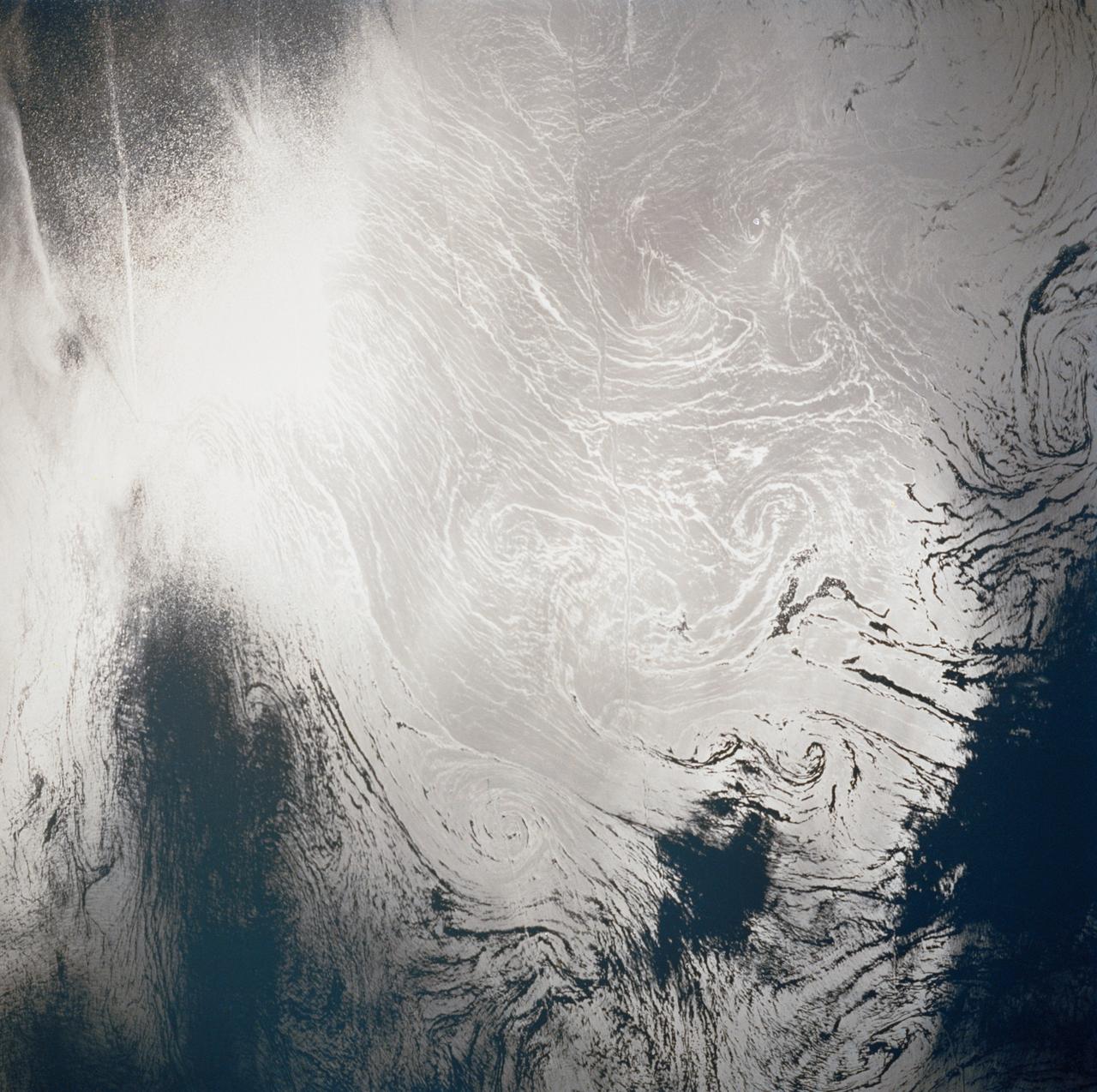 41G-38-060 (5-13 Oct 1984) --- A large ship wake in the central Mediterranean Sea is highlighted by sunglint in this handheld camera's view from STS-41G.  According to NASA and U.S. Navy scientists studying the STS-41G film, the depicted reflectance is similar to oil slicks seen in the various oceans of the world.  They note that it is apparent that a ship is pumping a mixture of bilge water and oil overboard.  The crew consisted of astronauts Robert L. Crippen, commander; Jon A. McBride, pilot; mission specialist's Kathryn D. Sullivan, Sally K. Ride, and David D. Leestma; Canadian astronaut Marc Garneau; and Paul D. Scully-Power, payload specialist.        EDITOR'S NOTE: The STS-41G mission had the first American female EVA (Sullivan); first seven-person crew; first orbital fuel transfer; and the first Canadian (Garneau).