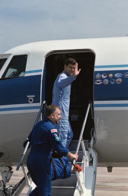 NASA image: Payload Specialists Garneau and Scully-Power prepare to leave for KSC