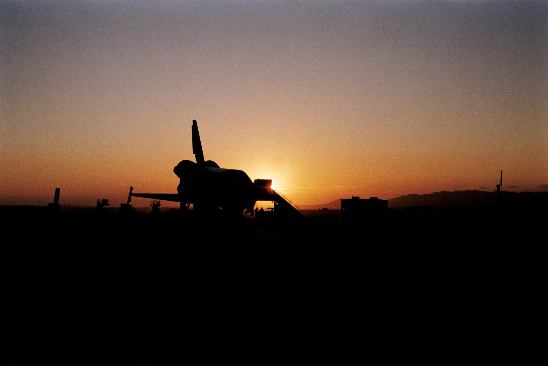 Space Shuttle Discovery is seen at sunset after it landed at Edwards Air Force Base on September 3, 1985