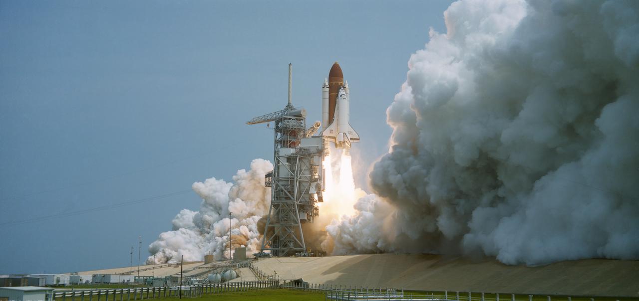51B-S-052 (20 April 1985) --- The STS 51-B Spacelab 3 mission begins with the liftoff of the Challenger from Pad 39A at 12:02 p.m. (EDT).  The Spacelab-3 configuration consists of a long module and a Mission Experiment Support Structure (MPESS).  The object of the mission is to conduct applications, science and technology-oriented experimentation requiring the low-gravity of Earth orbit and extended duration stable vehicle attitude. Mission emphasis will be on materials processing. The seven-member crew consists of astronauts Robert F Overmyer, commander; Frederick D. Gregory, pilot; Don L. Lind, Norman E. Thagard and William E. Thornton; all mission specialists and payload specialists Taylor G. Wang and Lodewijk van den Berg.  The mission is planned for 7 days with a landing at Dryden Flight Research Facility, Edwards California scheduled for May 6.