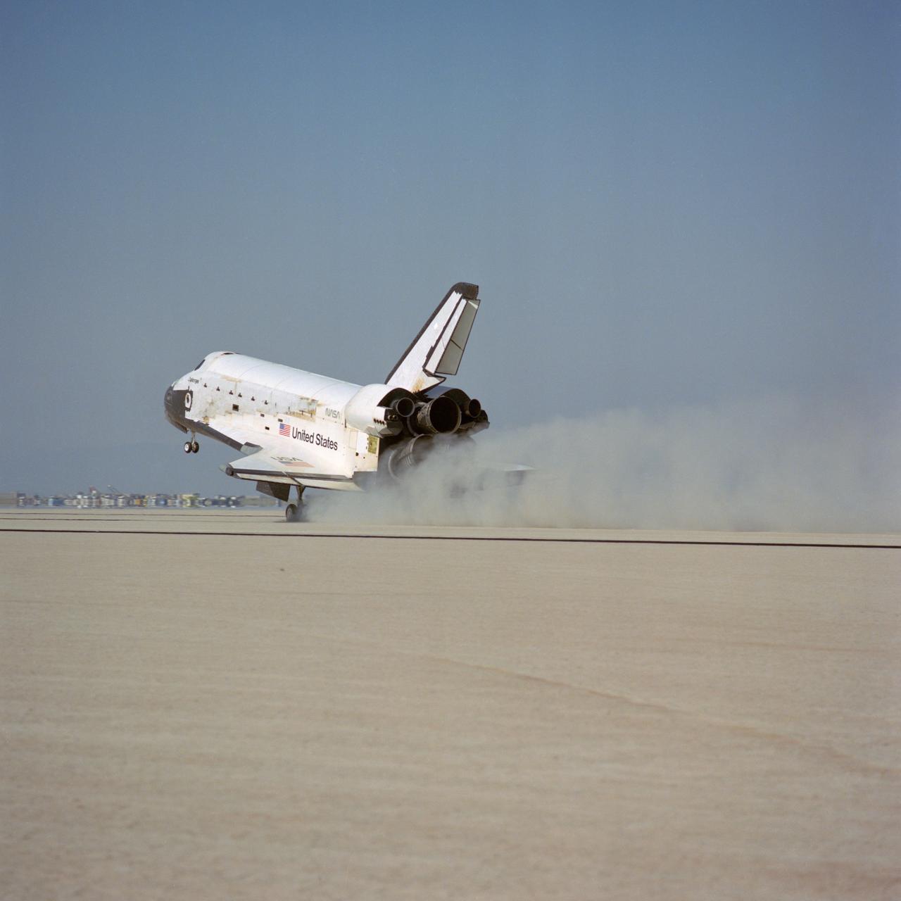 51B-S-071 (6 May 1985) --- The Space Shuttle Challenger lands on Runway 17 at Edwards Air Force Base to complete a week in space for its seven-member crew and a variety of payload.  The vehicle stopped at 9:12:05 a.m. (PDT), May 6, 1985.  Onboard were astronauts Robert F. Overmyer, Frederick D. Gregory, Don L. Lind, Norman E. Thagard and William E. Thornton of National Aeronautics and Space Administration (NASA); and payload specialists Lodewijk van den Berg and Taylor G. Wang.