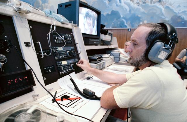 NASA image: View of Lou McFadden, amateur radio operator at JSC, at SAREX station