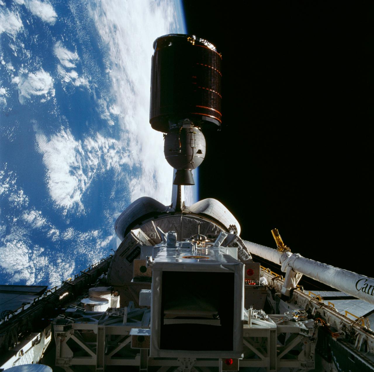 51G-32-082 (17-24 June 1985) --- Mexico's Morelos satellite rises from Discovery's cargo bay to begin its life in space.