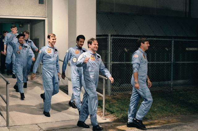 NASA image: STS 51-G crewmembers depart KSC's operations and checkout building