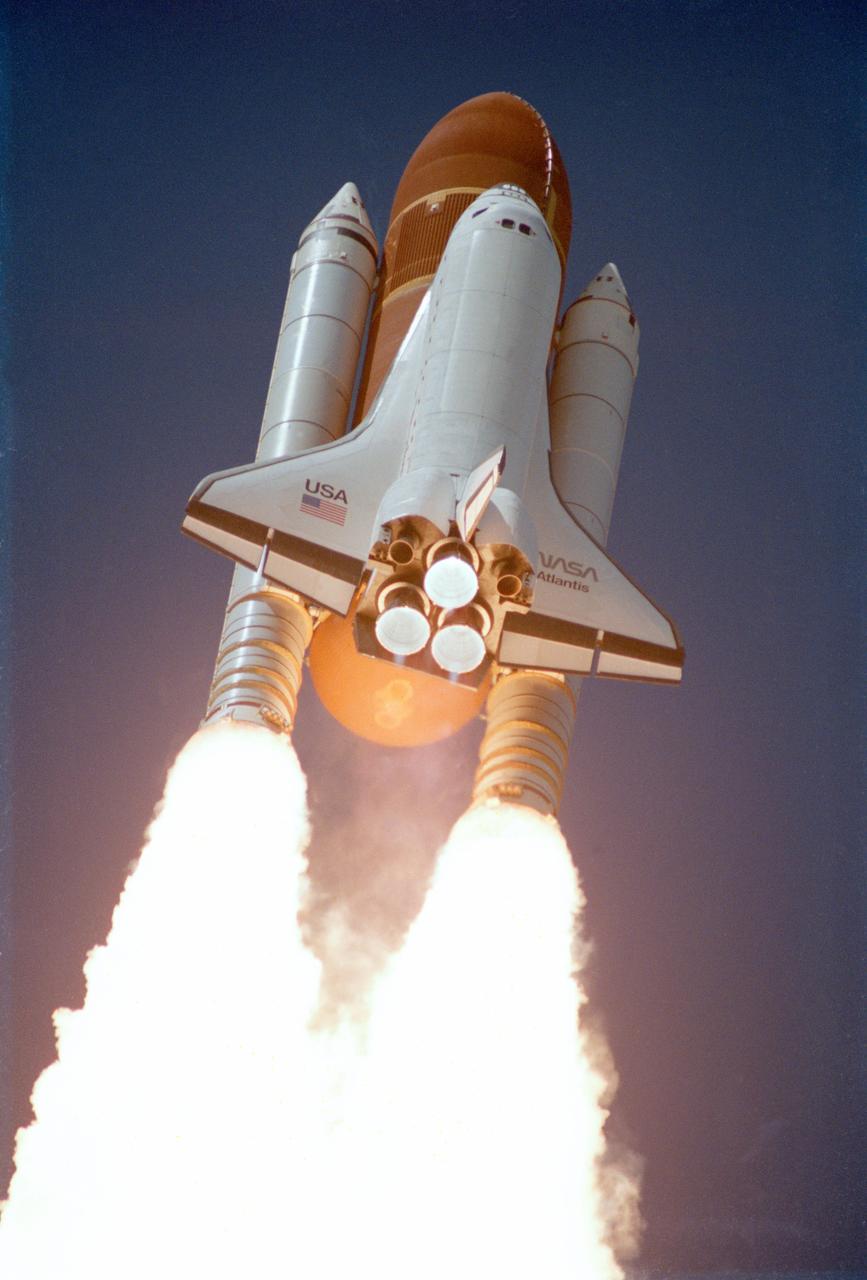 51J-S-003 (3 Oct 1985) --- This 35mm frame was taken moments after the Space Shuttle Atlantis cleared the launch tower to begin its first mission in space.  Onboard, ready to carry out STS-51J mission were astronauts Karol J. Bobko, commander; Ronald J. Grabe, pilot; Robert L. Stewart and David C. Hilmers, mission specialist; and U.S.A.F. Major William A. Pailes, payload specialist.