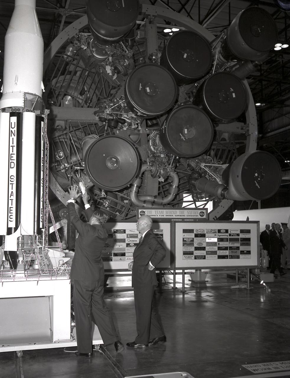 Dr. von Braun briefs President Eisenhower at the front of the S1 Stage (first Stage) of the Saturn 1 vehicle at the Marshall Space Flight Center (MSFC) on September 8, 1960. The President's visit was to dedicate Marshall Space Flight Center as a new NASA field center in honor of General George C. Marshall.