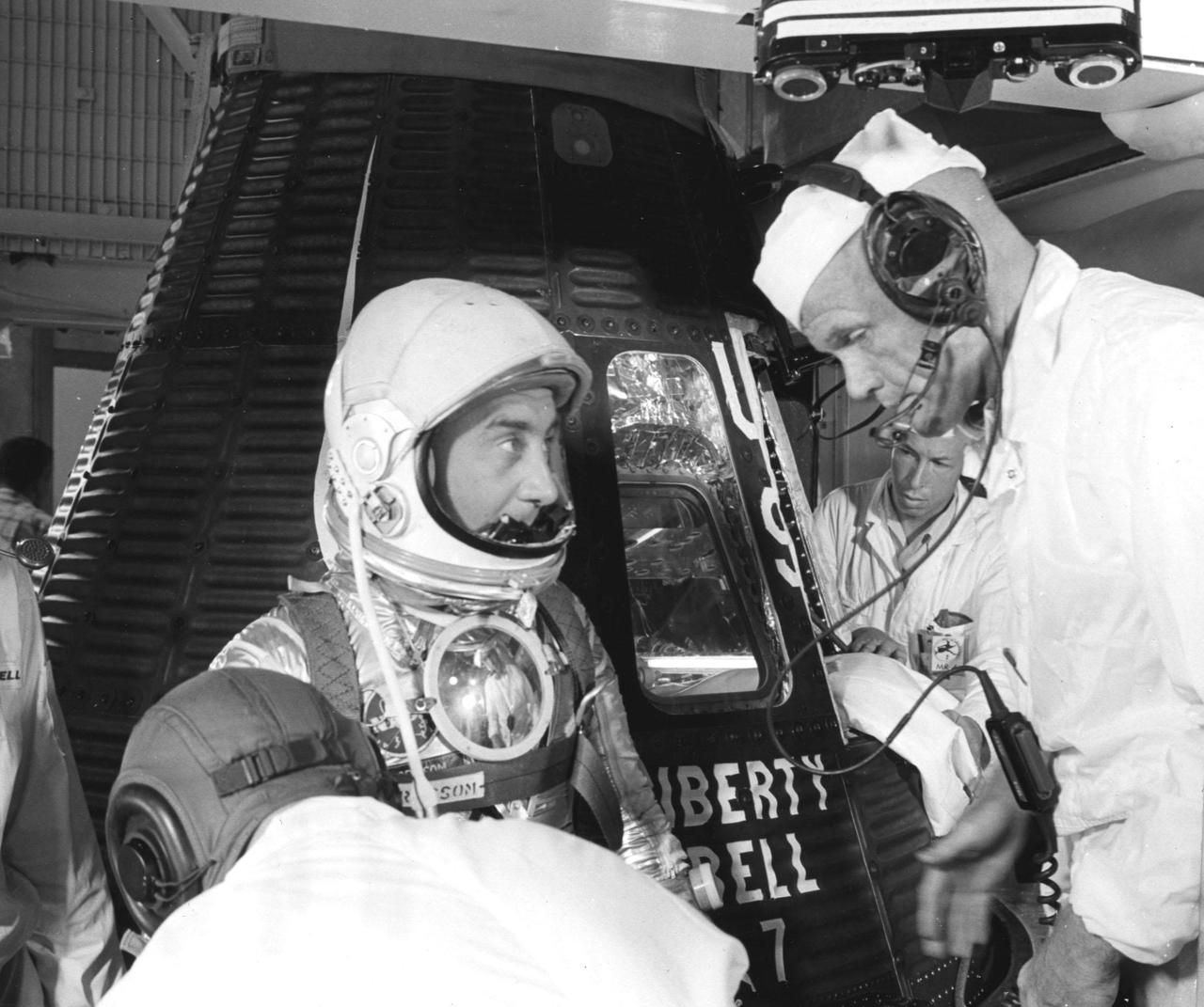 KENNEDY SPACE CENTER, FLA. -- Astronaut Virgil I. Grissom, suited up and ready to climb into Liberty Bell 7 spacecraft, talks with backup astronaut John Glenn prior to insertion.  The Mercury-Redstone 4 mission was scrubbed a few hours later due to unfavorable weather over the launch area.  (NASA Photo)