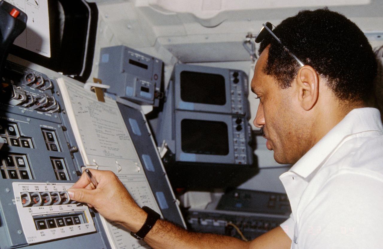 61C-09-035 (12-18 Jan. 1986) --- STS-61C pilot Charles F. Bolden is seen at controls on the aft flight deck of the Earth-orbiting space shuttle Columbia. Bolden was making his first spaceflight. Photo credit: NASA