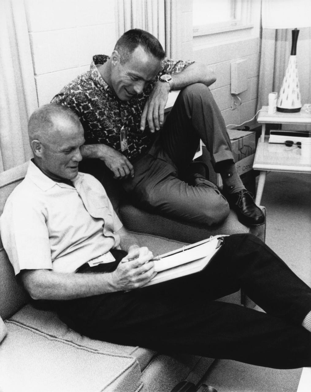 CAPE CANAVERAL, Fla. -- John Glenn makes last minute preparations with Scott Carpenter prior to the flight of MA-7.  Photo credit: NASA