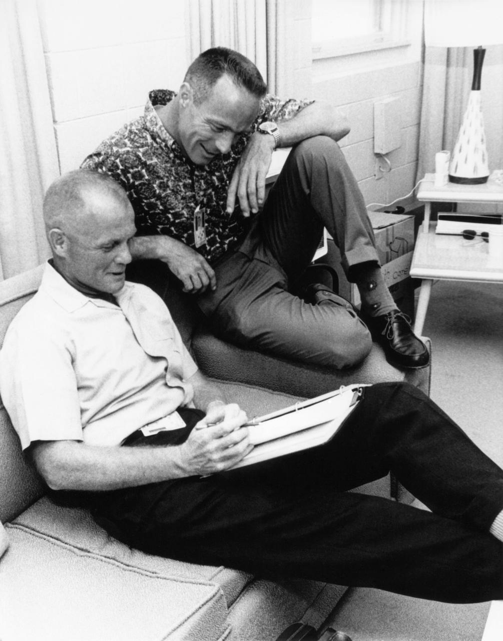 62-MA7-86 (1962) --- John Glenn (left) makes last minute preparations with Scott Carpenter prior to the flight of MA-7. Photo credit: NASA