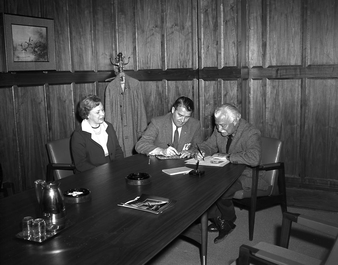 Mr. Mrs. Arthur Fiedler of the Boston Pops Orchestra and Dr. von Braun in his office during the Fiedlers' visit to the Marshall Space Flight Center (MSFC) on March, 23, 1962.