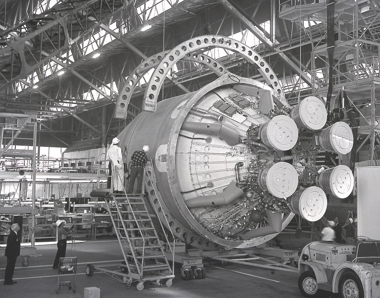 The Saturn I S-IV stage (second stage) for the SA-7 mission being prepared for shipment to Cape Canaveral, Florida. The S-IV stage had six RL-10 engines, which used liquid hydrogen and liquid oxygen as its propellants, arranged in a circle. Each RL-10 engine produced a thrust of 15,000 pounds for a total combined thrust of 90,000 pounds. The SA-7 mission was launched on September 18, 1964 from Cape Canaveral, Florida, and its S-IV stage made the second orbital flight.
