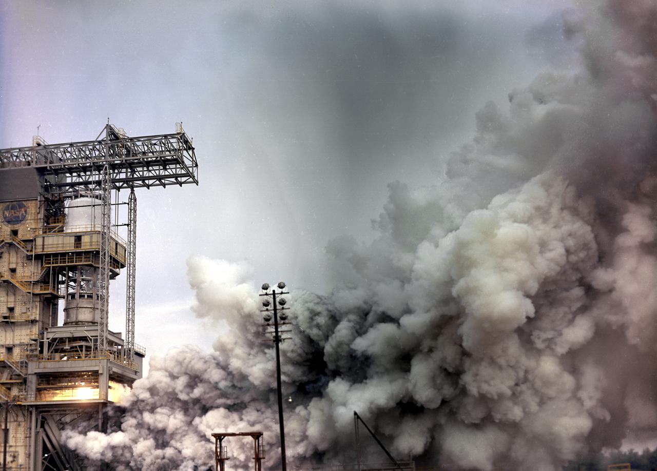 The static firing of a Saturn F-1 engine at the Marshall Space Flight Center's Static Test Stand.  The F-1 engine is a single-start, 1,5000,000 Lb fixed-thrust, bipropellant rocket system. The engine uses liquid oxygen as the oxidizer and RP-1 (kerosene) as fuel. The five-engine cluster used on the first stage of the Saturn V produces 7,500,000 lbs of thrust.