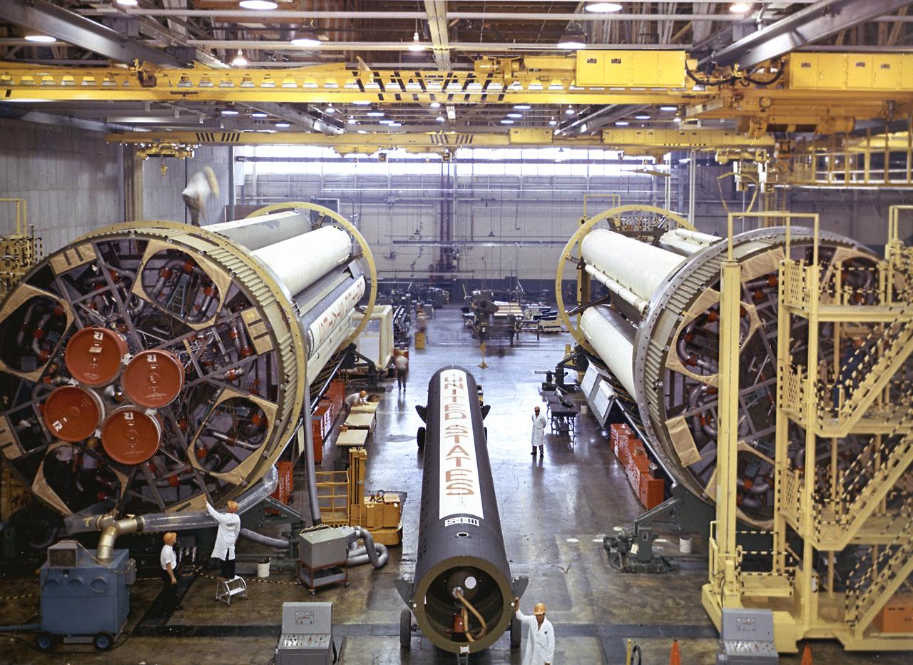 The Saturn I S-I stages for the SA-8 and SA-10 mission in final assembly phase in a manufacturing building at the Michoud Assembly Facility in New Orleans, Louisiana. The SA-8 mission was launched on May 25, 1965 with the first industry-built booster, and deployed the Pegasus II Micrometeoroid Detection satellite. The SA-10 mission was the last Saturn I mission, launched on July 30, 1965, and carried the Pegasus III Meteoroid Detection satellite.