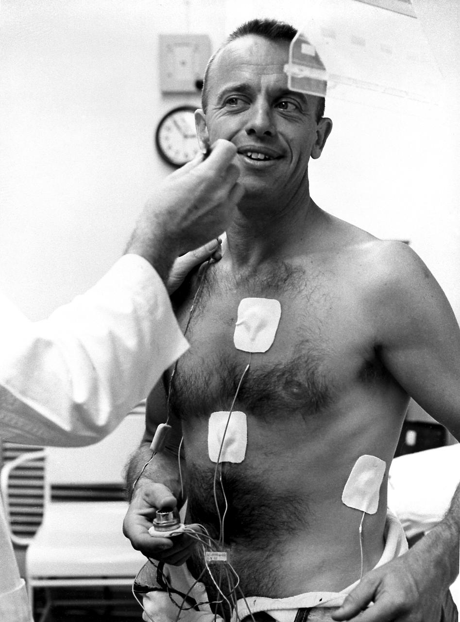 Astronaut Alan Shepard underwent a physical examination prior to the first marned suborbital flight. Freedom 7 carrying Astronaut Alan Shepard, boosted by the Mercury-Redstone launch vehicle, lifted off on May 5, 1961. Astronaut Shepard became the first American in space. 