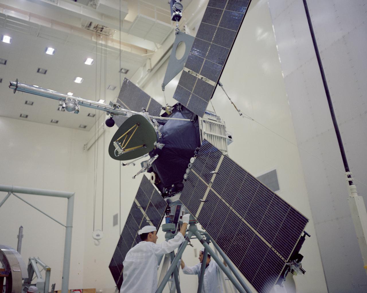 CAPE KENNEDY, Fla. -- In the AO Building at Cape Kennedy Air Force Station in Florida, the Mariner 3 spacecraft is processed prior to mating with its payload faring. Mariner is one of two identical deep-space probes designed and built by the Jet Propulsion Laboratory for NASA's Mariner Mars 1964 project. Mariner 3 is intended to conduct close-up scientific observations of Mars and transmit information back to Earth on interplanetary space and the space surrounding the Red Planet. Photo Credit: NASA